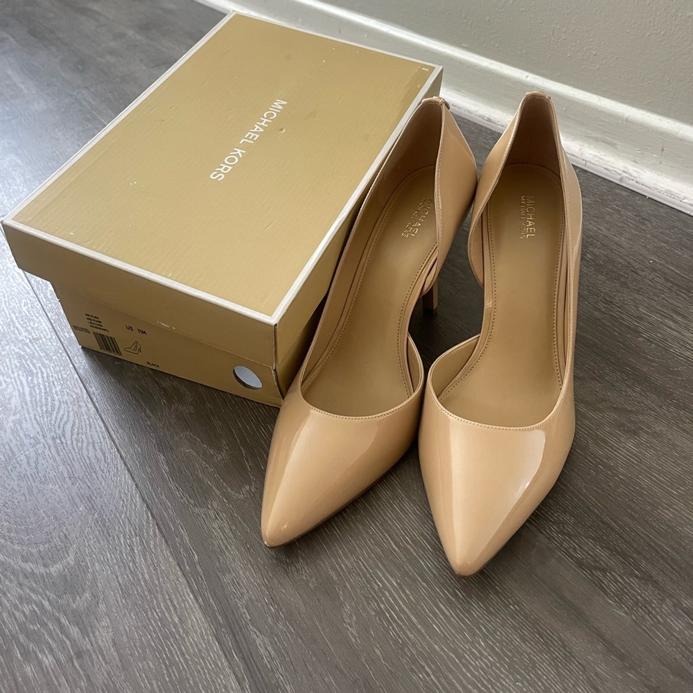 Michael Kors pumps size 11M. Brand new.
